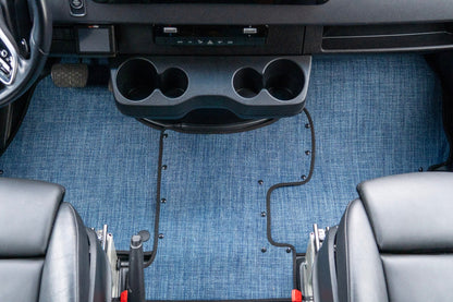 Sprinter interior with cup holders and blue floor mat