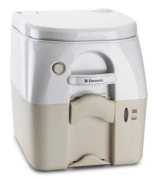 Portable toilet with beige base and white top on a white background