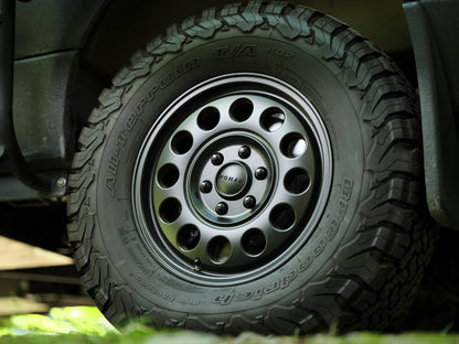 Close-up of a Nomad off-road wheel with BFGoodrich All-Terrain T/A KO2 tire on a Nomad Vanz Hygge Sprinter camper van