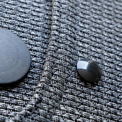 Nomad Vanz Matz in Meteor — macro closeup of Chilewich Link weave with floor plug and dome snap fastener
