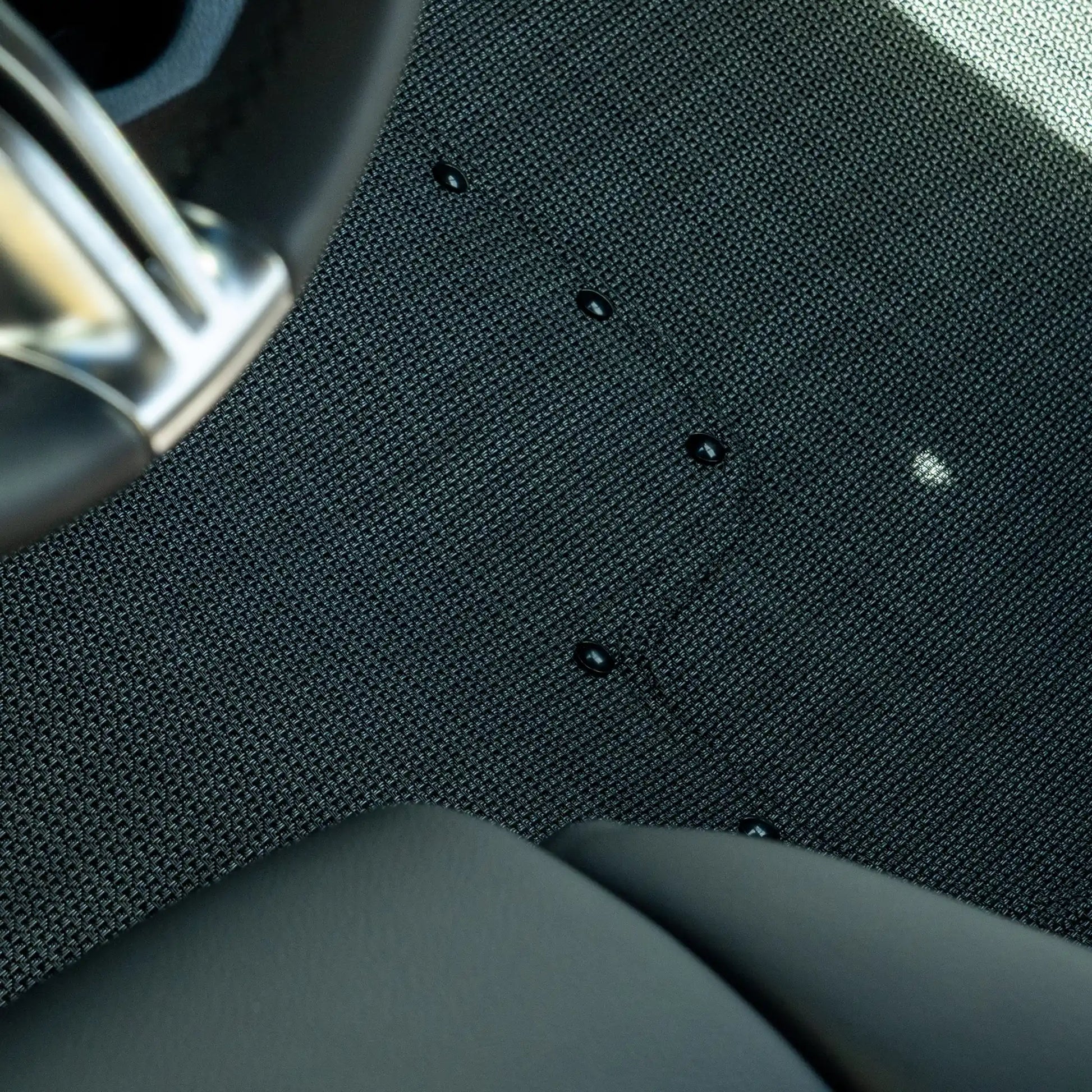 Nomad Vanz Matz in Meteor — driver mat corner with snap fasteners and seat base, Mercedes-Benz Sprinter