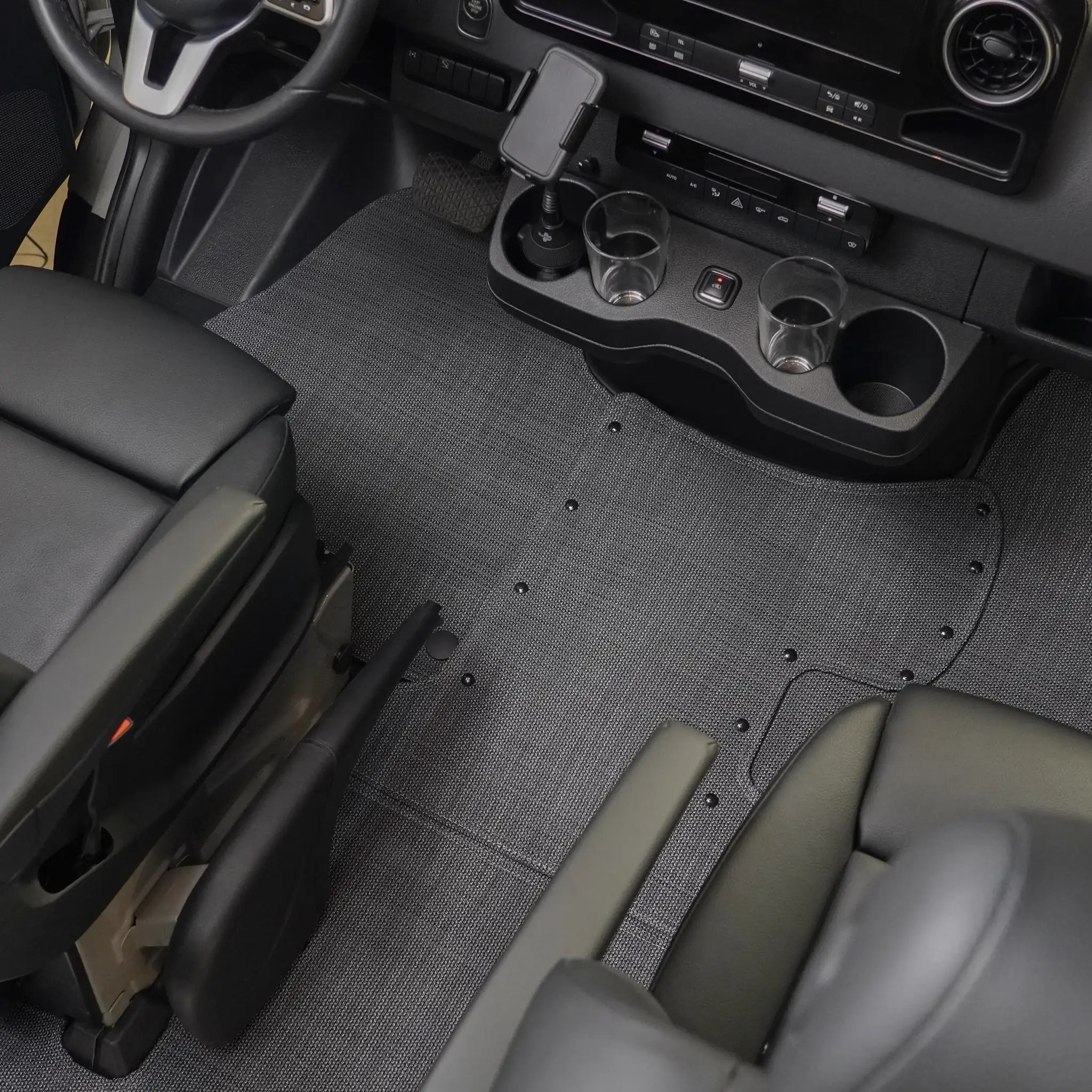 Nomad Vanz Matz Chilewich floor mats installed in a 2019+ Mercedes-Benz Sprinter VS30 cab